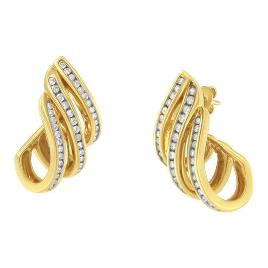 Front angled view of a pair of yellow metal earrings with intertwined loops accented by multiple rows of small white gemstones in a channel setting.