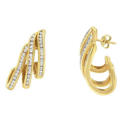 Close-up front and side view of yellow metal earrings featuring wavy design with channel-set white round gemstones.