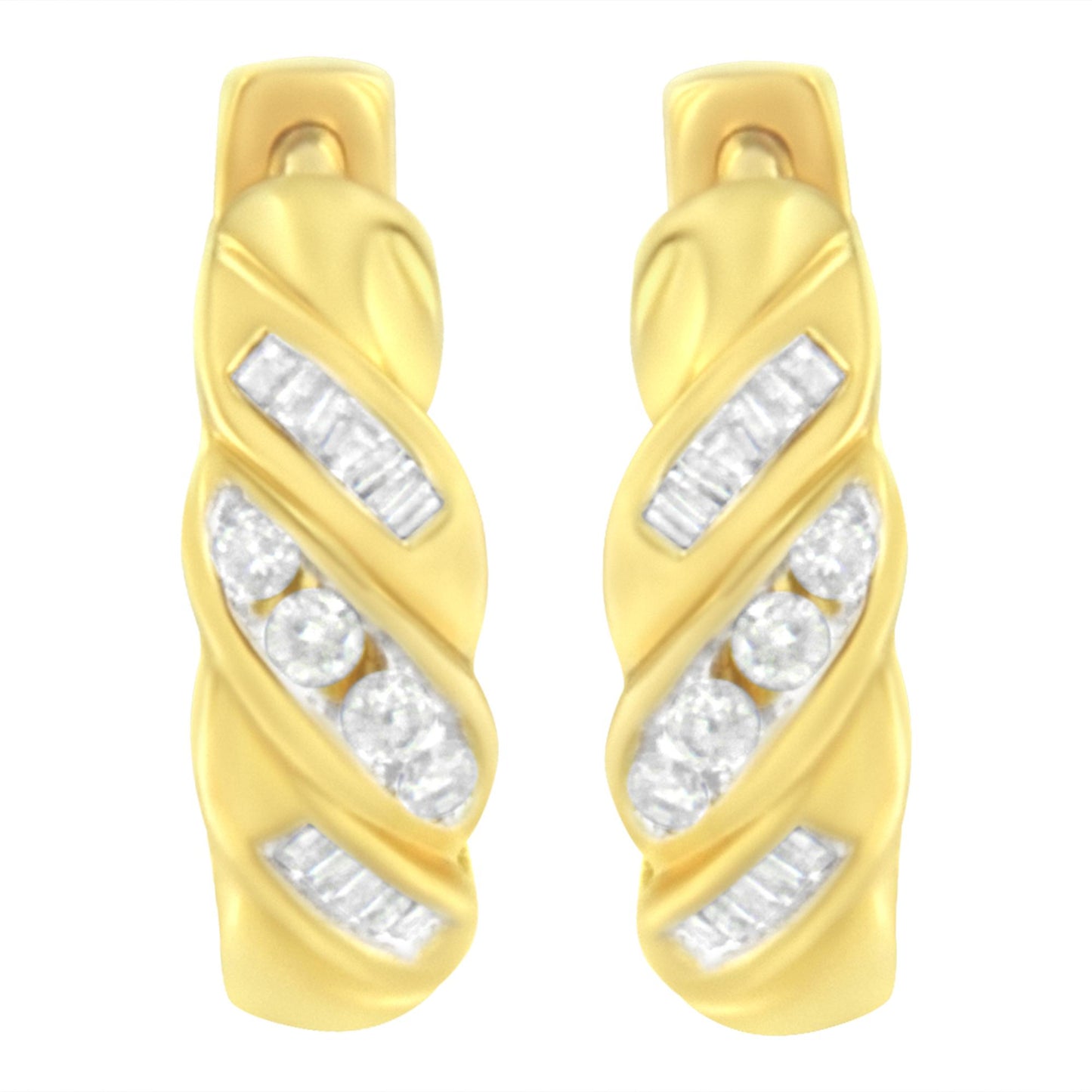 Pair of yellow metal earrings with channel-set white round and baguette-shaped gemstones, shown from a front angle.