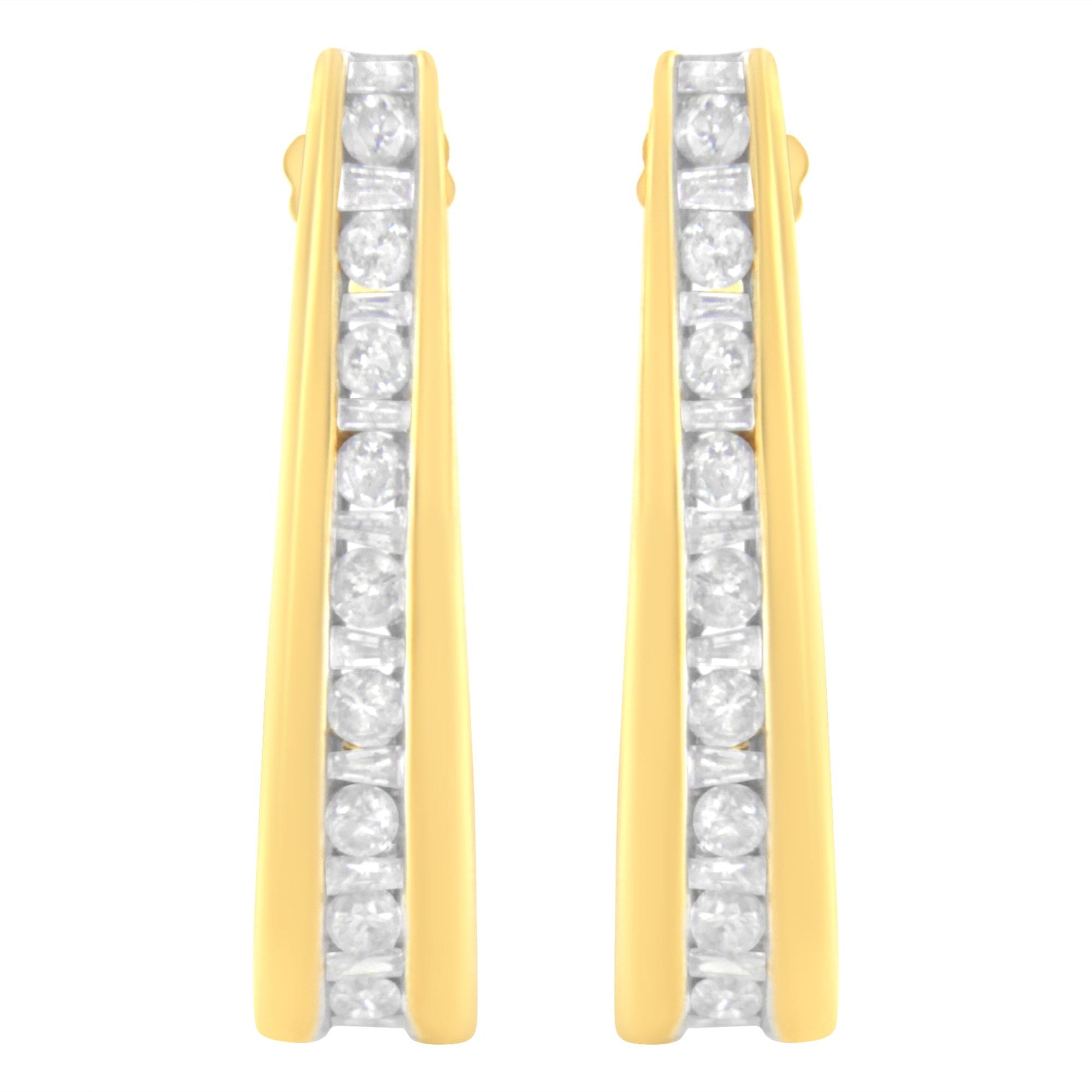 Front view of a pair of yellow metal earrings with alternating round and baguette shape white gemstones set in a channel setting along the center.