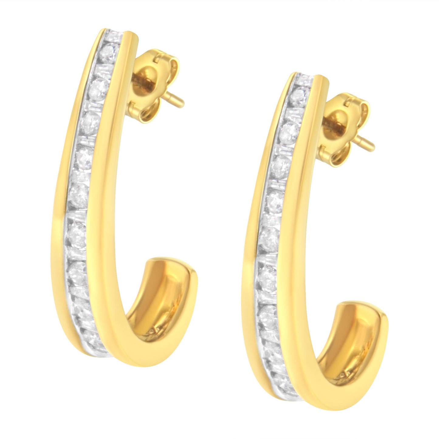 Pair of yellow metal hoop earrings with channel-set white round and baguette shaped gemstones, shown from a front angled view.