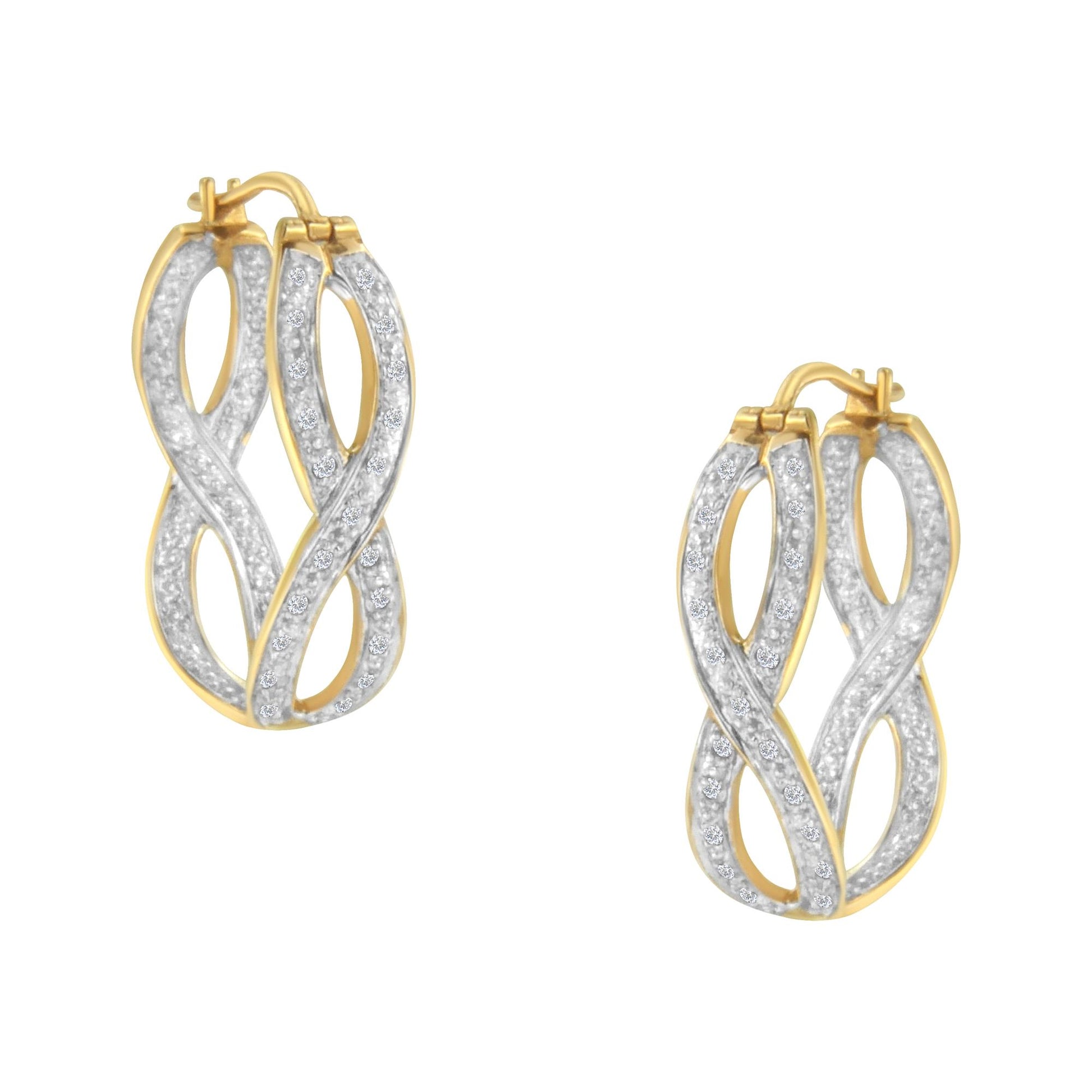 Close-up front angle view of a pair of yellow metal earrings with an intertwined design, featuring two rows of prong-set round white gemstones.
