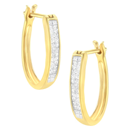 Pair of yellow metal hoop earrings with front-facing rectangular panels set with small white square-shaped gemstones in an invisible setting, shown at a slight angle against a white background.