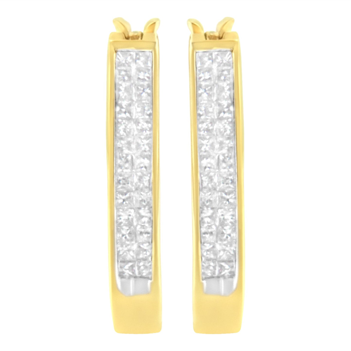 Front-facing close-up of pair of yellow metal hoop earrings with rows of white princess shape gemstones set invisibly along the front surface.