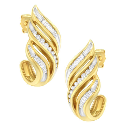 Close-up front angle of yellow metal earrings featuring alternating rows of round and baguette white gemstones in a channel setting.