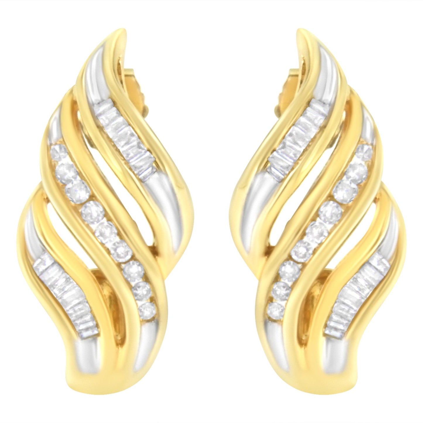 Pair of yellow metal earrings with curved design, featuring channel-set white round and baguette-shaped gemstones, shown from front angle.