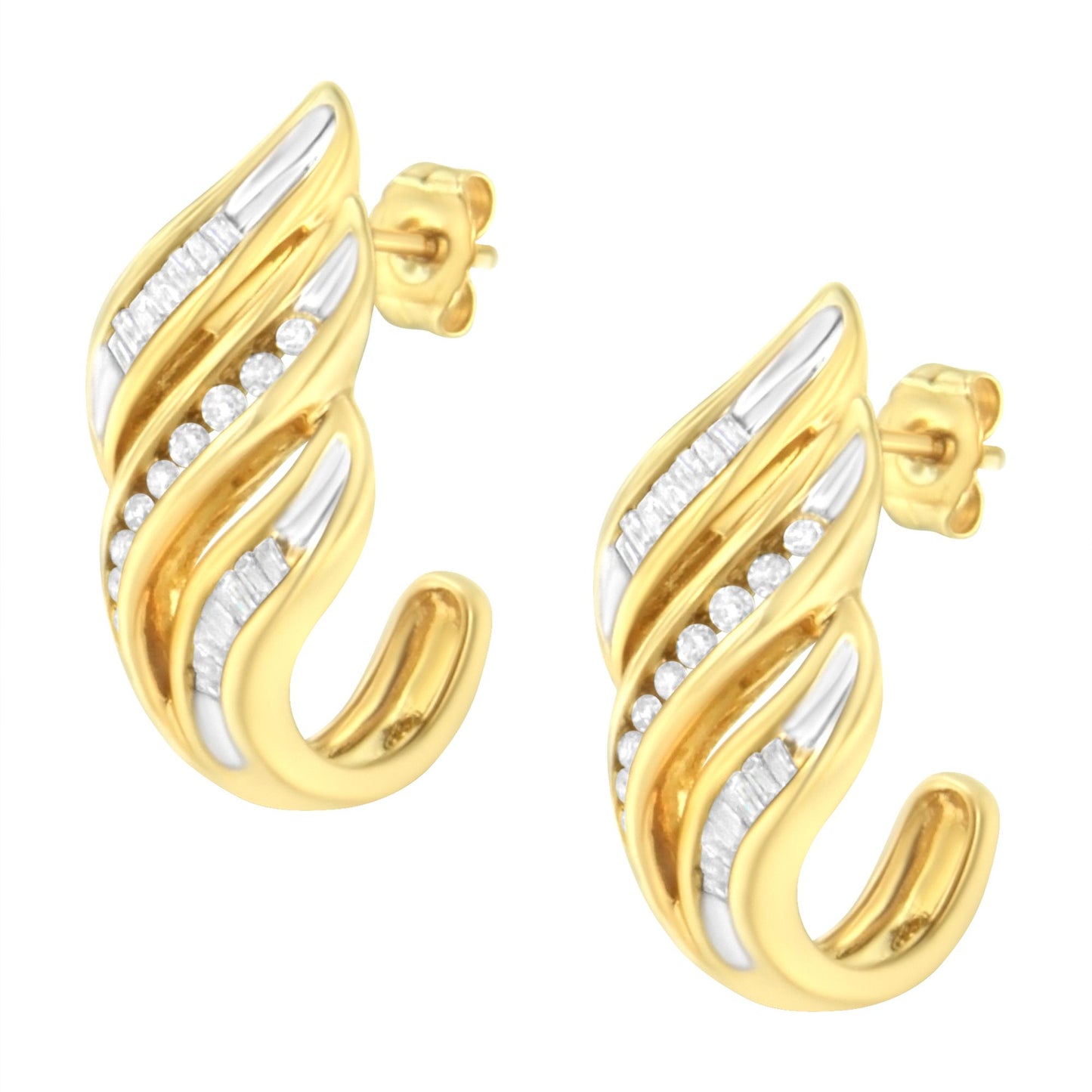 Pair of yellow metal hoop earrings with white round and baguette gemstones in channel settings, shown at a slight angle.