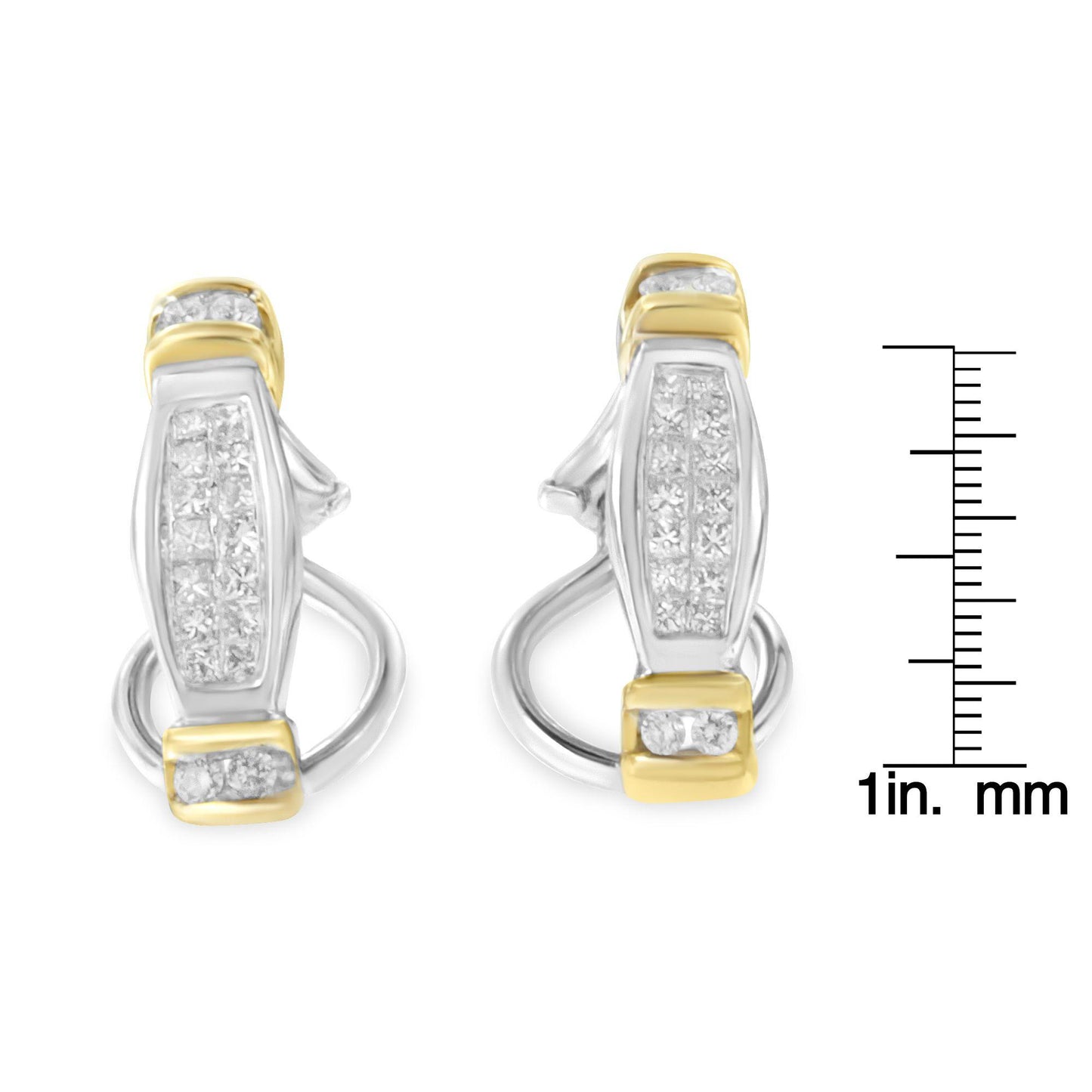 Front-facing shot of two-toned earrings with white round and princess-shaped gemstones in channel settings, shown next to a ruler for size reference.