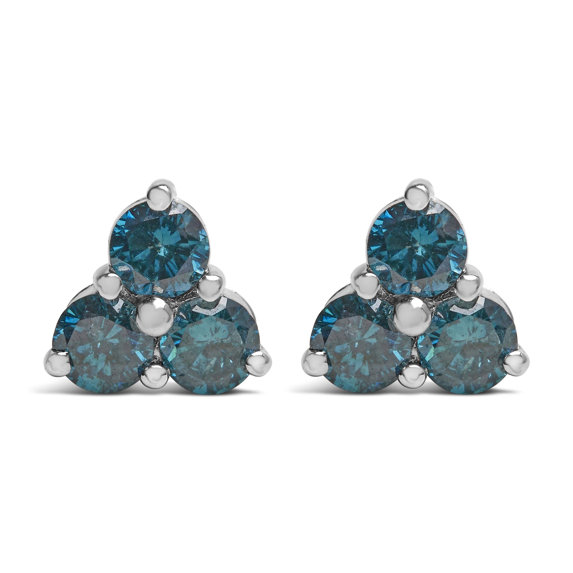 Front view of white metal triangular cluster earrings each with three round blue gemstones in prong settings.