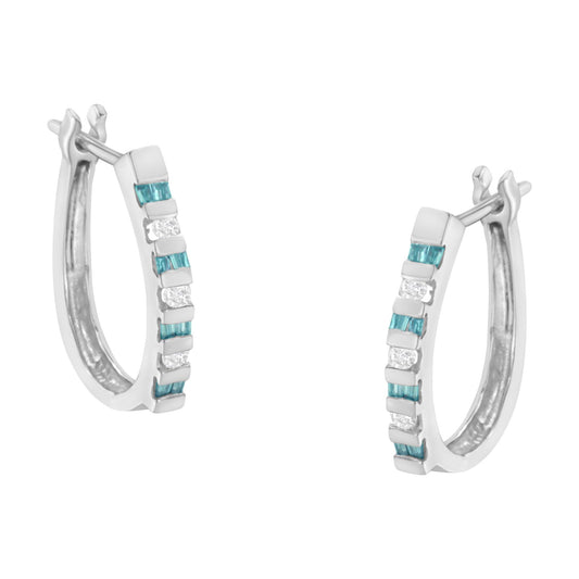 Pair of white metal hoop earrings with alternating channel-set white round and blue baguette gemstones, shown from a slightly angled front view.