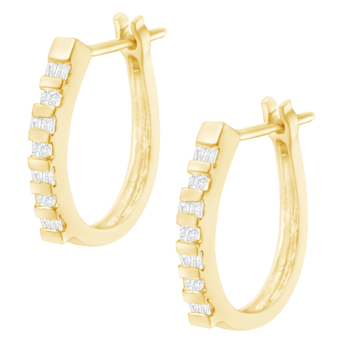 Pair of yellow hoop earrings with alternating round and baguette white gemstones in channel settings, shown in a front diagonal view.