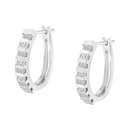 Pair of white metal hoop earrings with alternating round and rectangular white gemstones in channel settings, angled front view.