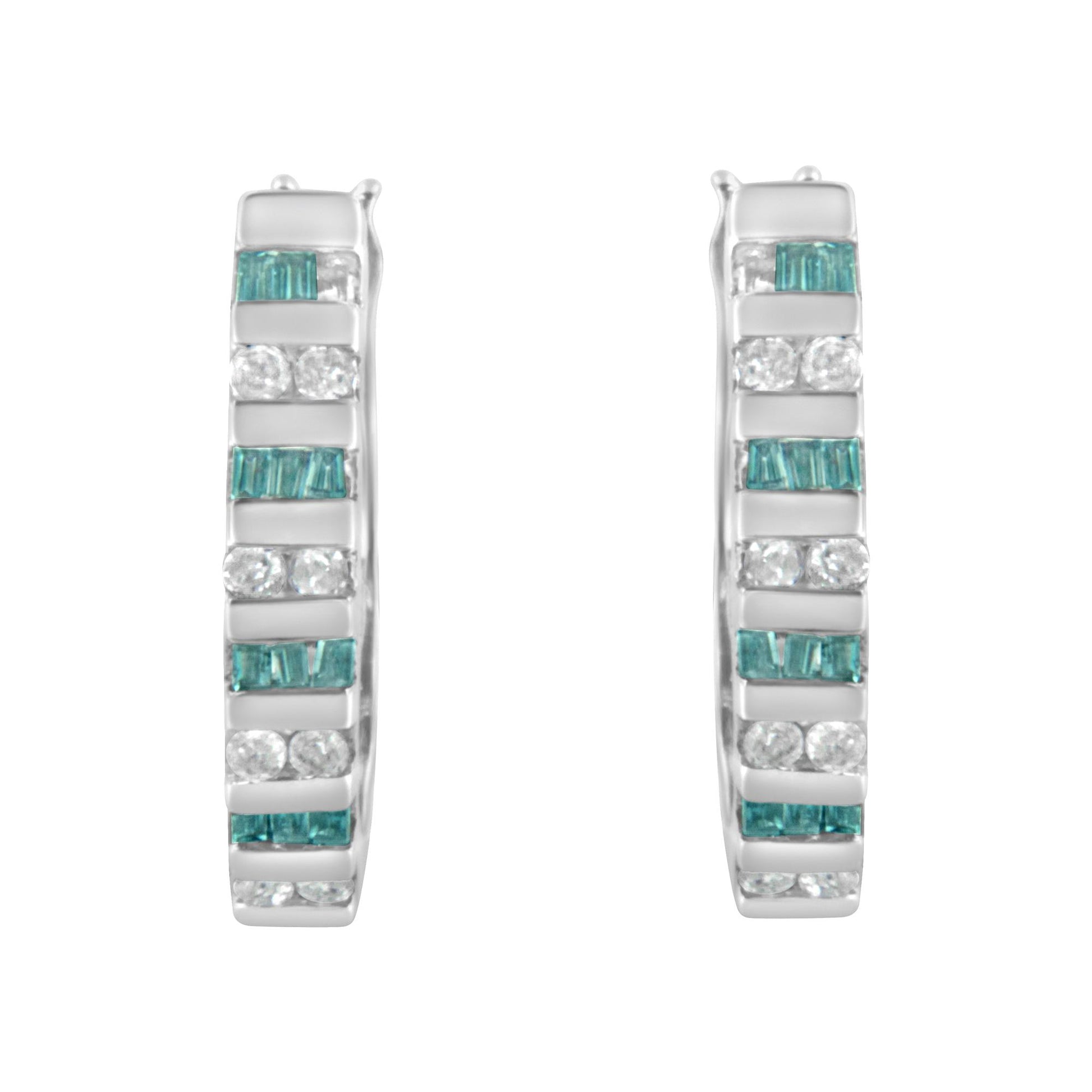 Pair of white metal hoop earrings with alternating channels of round white gemstones and baguette blue gemstones, shown from the front angle.