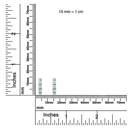 Pair of white metal earrings with alternating rows of channel-set white round and blue baguette gemstones, shown upright on a ruler for size reference.