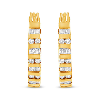 Front view of a pair of yellow metal earrings with alternating rows of round and baguette-shaped white gemstones set in channels.
