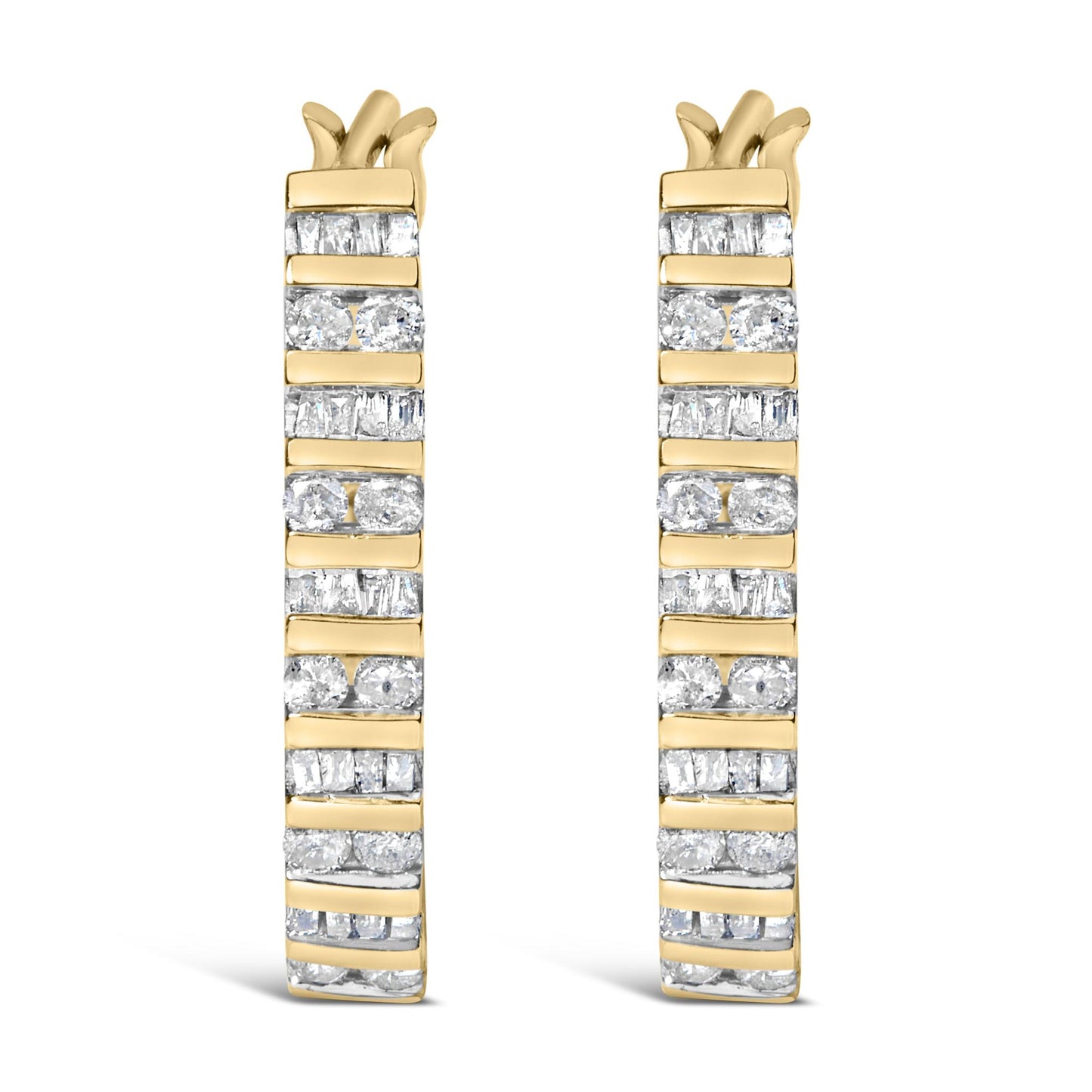 Front-facing close-up of a pair of yellow metal earrings with alternating rows of white round and baguette gemstones in a channel setting.