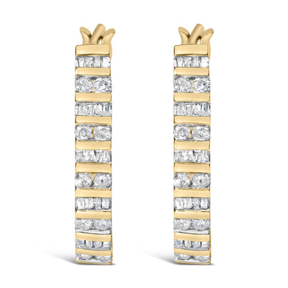 Front-facing close-up of a pair of yellow metal earrings with alternating rows of white round and baguette gemstones in a channel setting.
