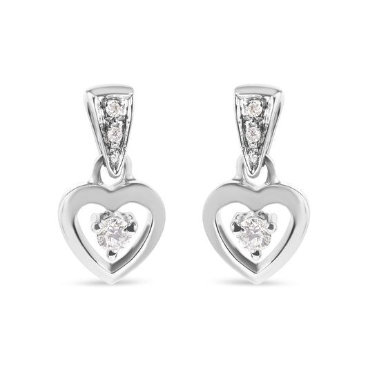 Front view of white metal heart-shaped earrings with prong-set round white gemstones, shown as a pair.