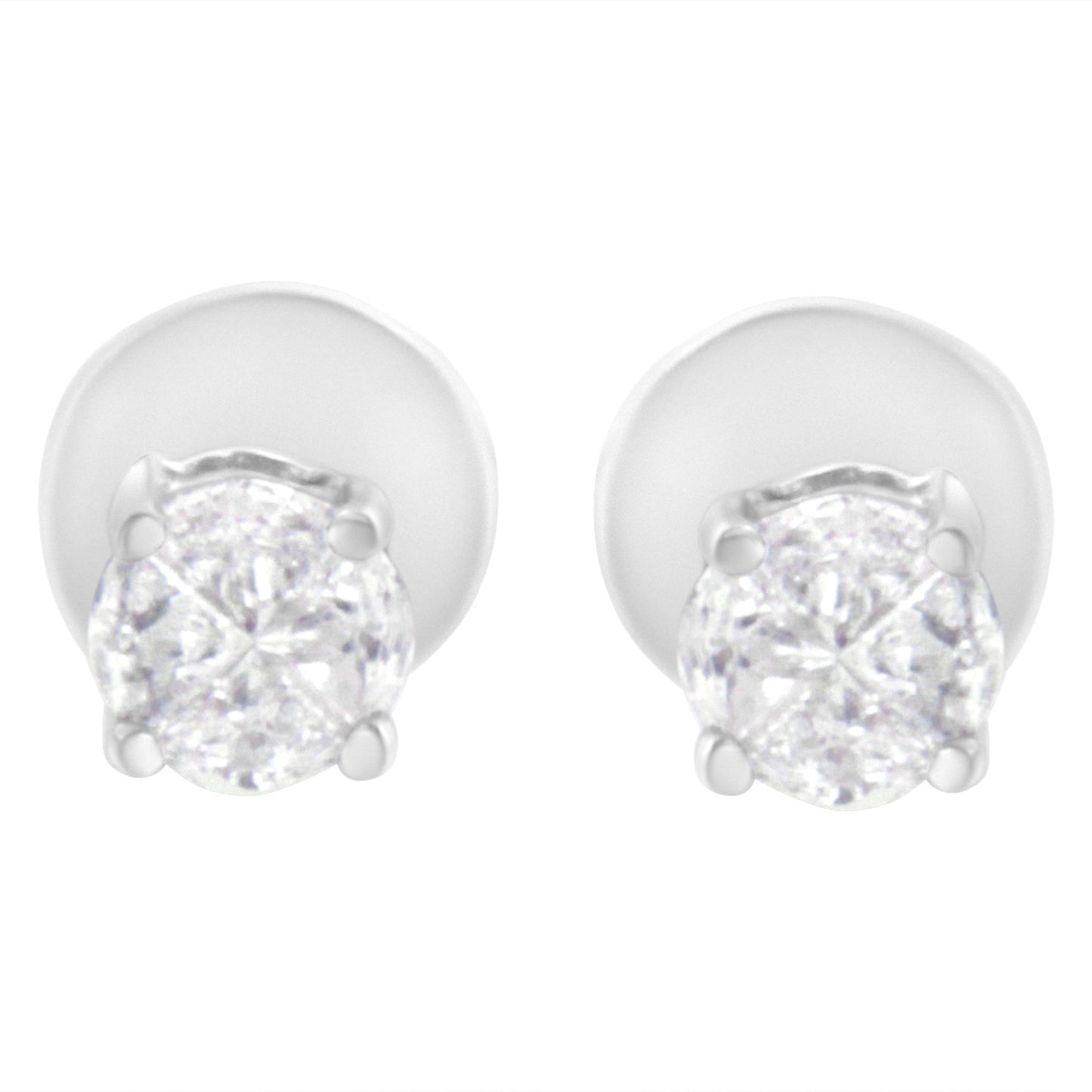 Front angle view of white metal stud earrings with round white gemstones in prong settings.