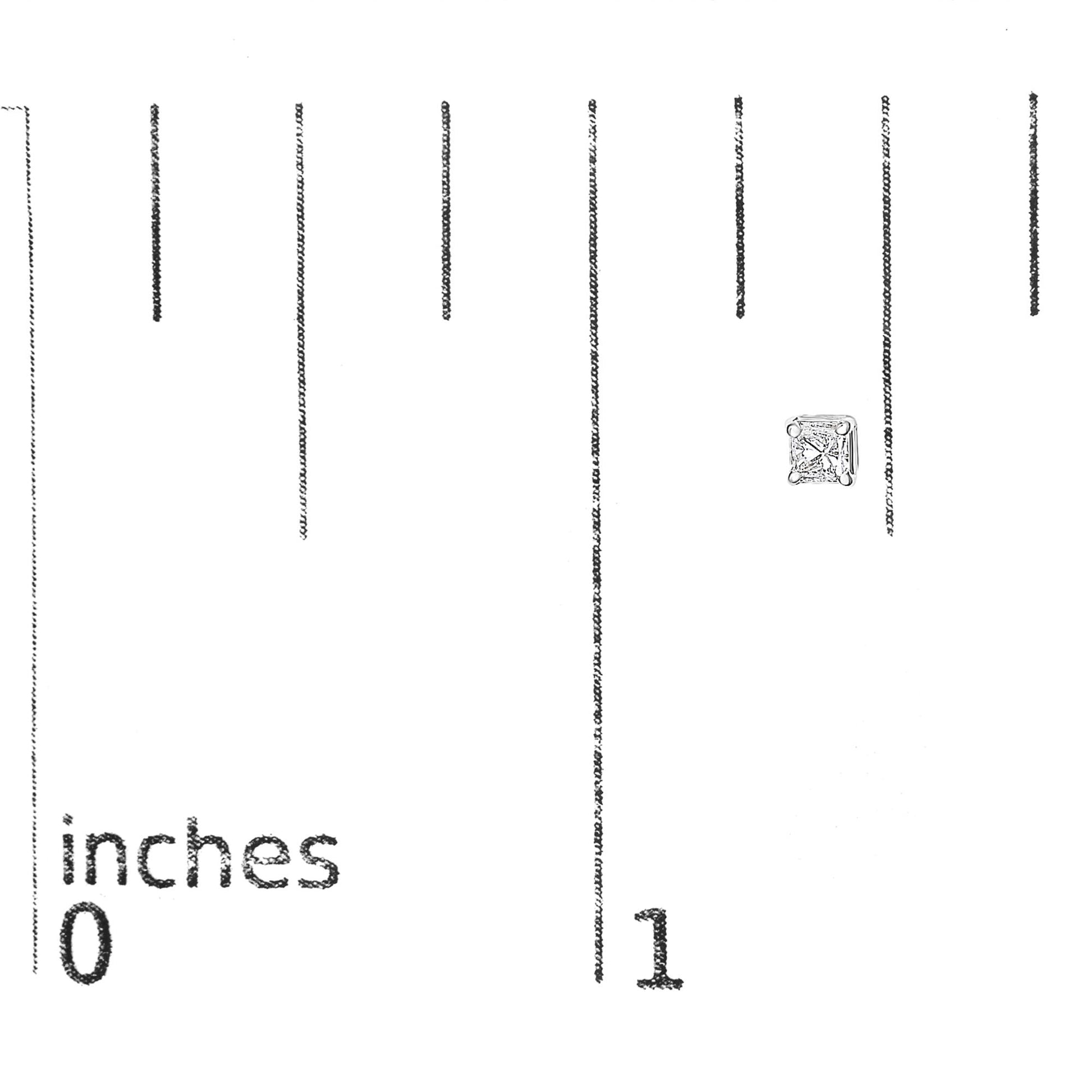 Single white metal princess shape earring with white gemstone in prong setting, shown on a ruler for size reference, front angle.