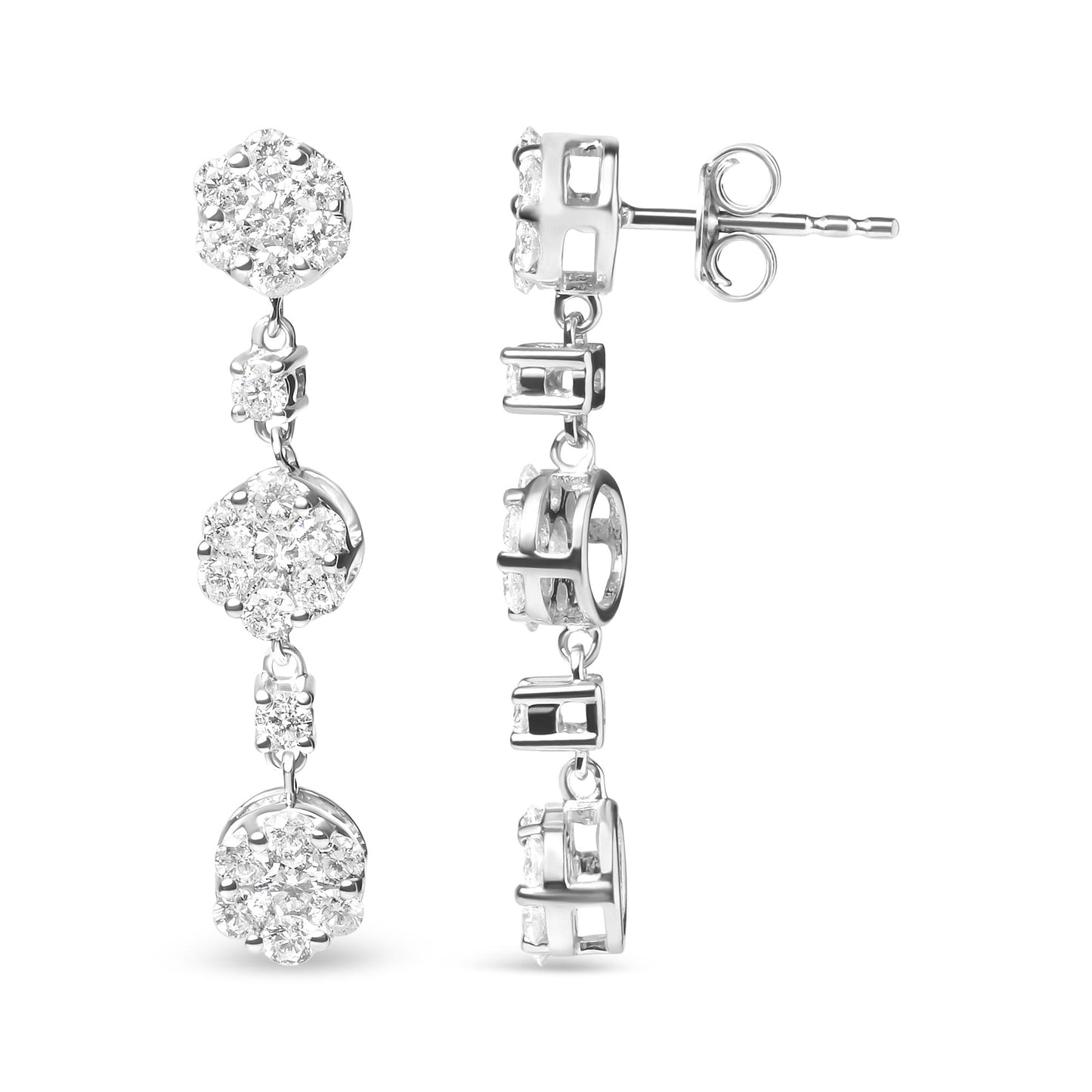 Front and side view of white metal drop earrings with clusters of round white gemstones in prong settings.