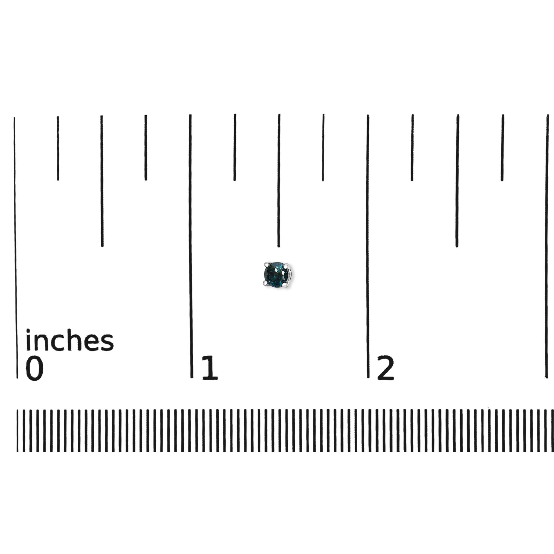 Close-up front view of a white metal round blue gemstone stud earring shown on a scale.