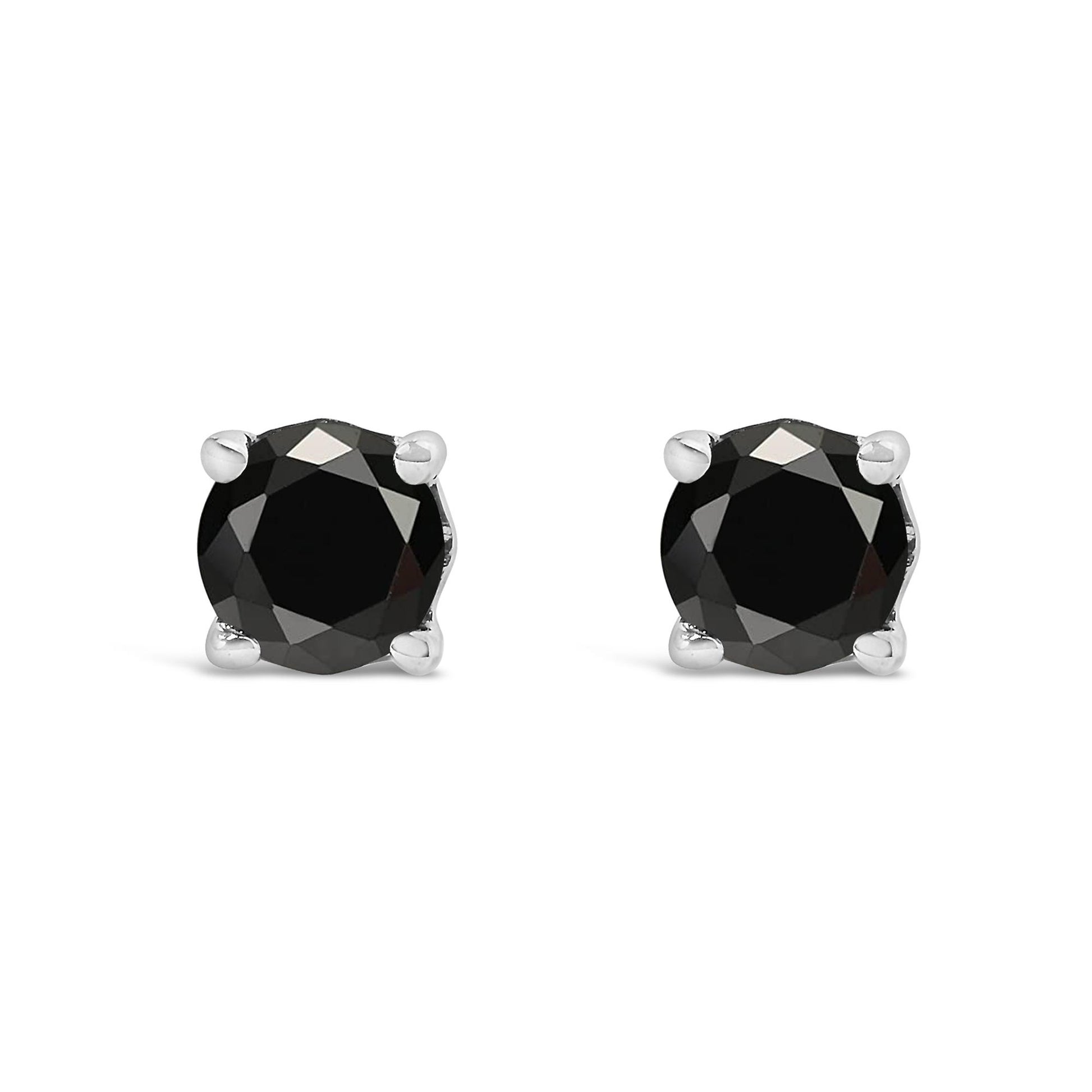 Front view of a pair of white metal stud earrings with round black gemstones in prong settings.