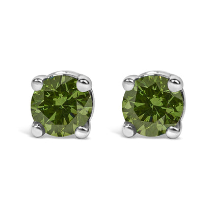 Pair of white metal stud earrings with round green gemstones in prong settings, front view.