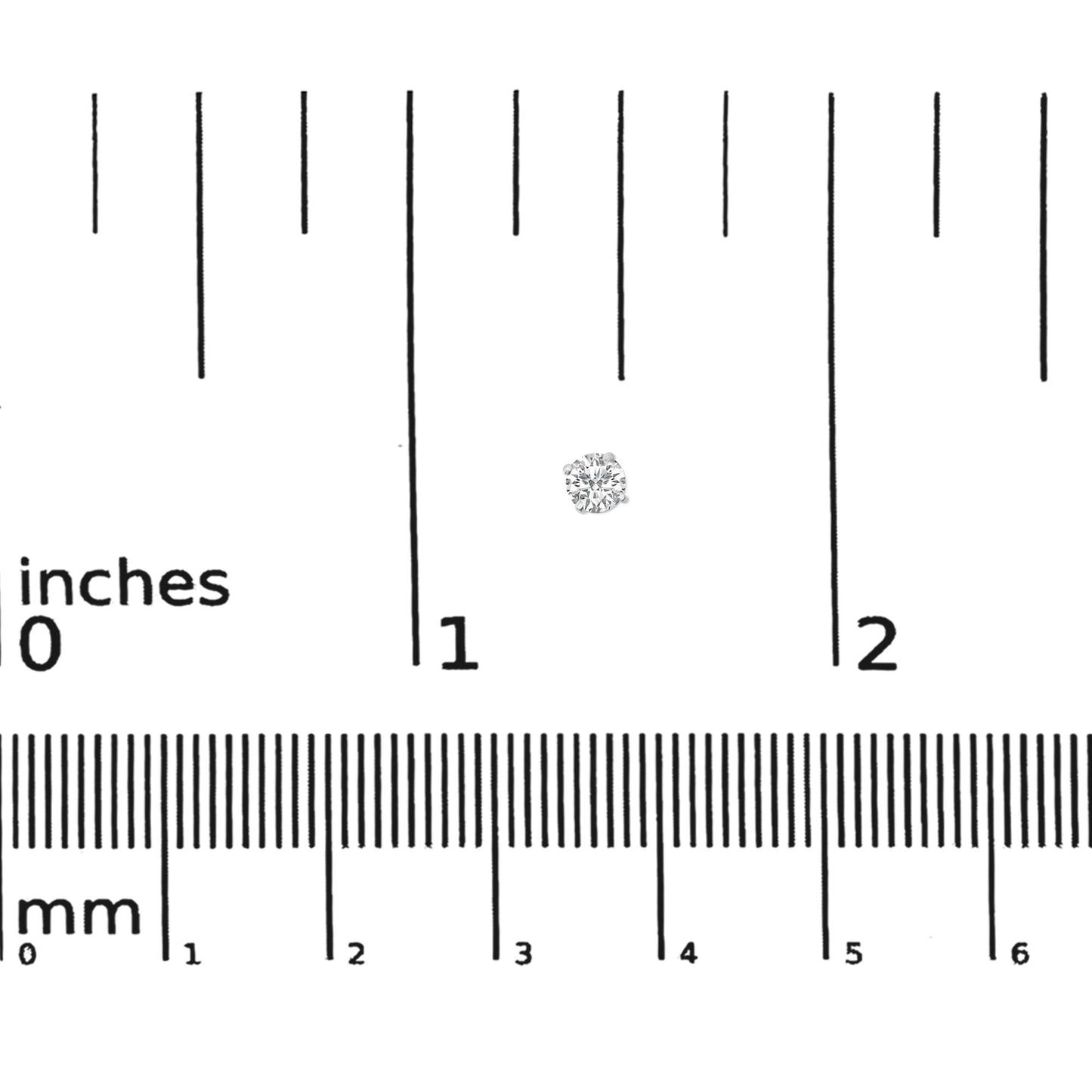 Close-up front view of a round white gemstone earring with a four-prong setting displayed on a ruler for size reference.
