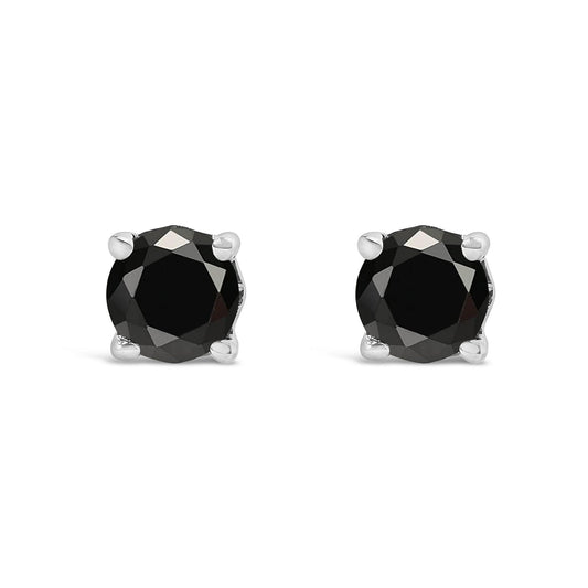 Front view of white metal stud earrings with round black gemstones in 4-prong settings.