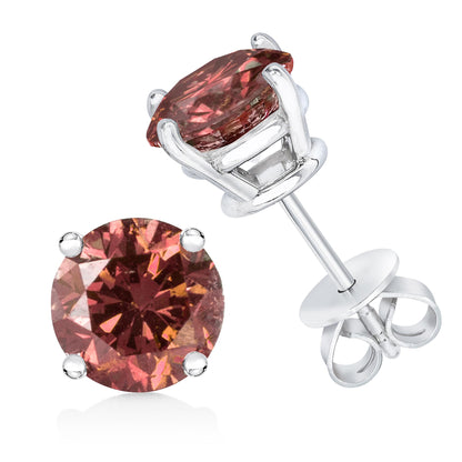 Close-up front and angled side view of a white metal stud earring with a round pink gemstone in a four-prong setting.