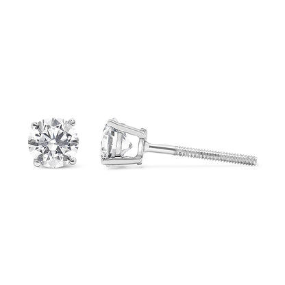 Pair of white metal stud earrings with round white gemstones in prong settings, shown from front and side angle on a white background.