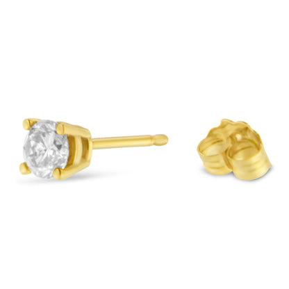 Close-up front and side view of a yellow metal stud earring with a round white gemstone in prong setting and its matching back.