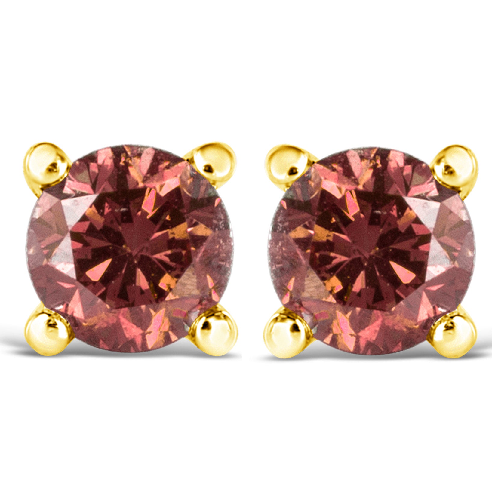 Close-up front view of a pair of yellow metal stud earrings with round pink gemstones in four-prong settings.