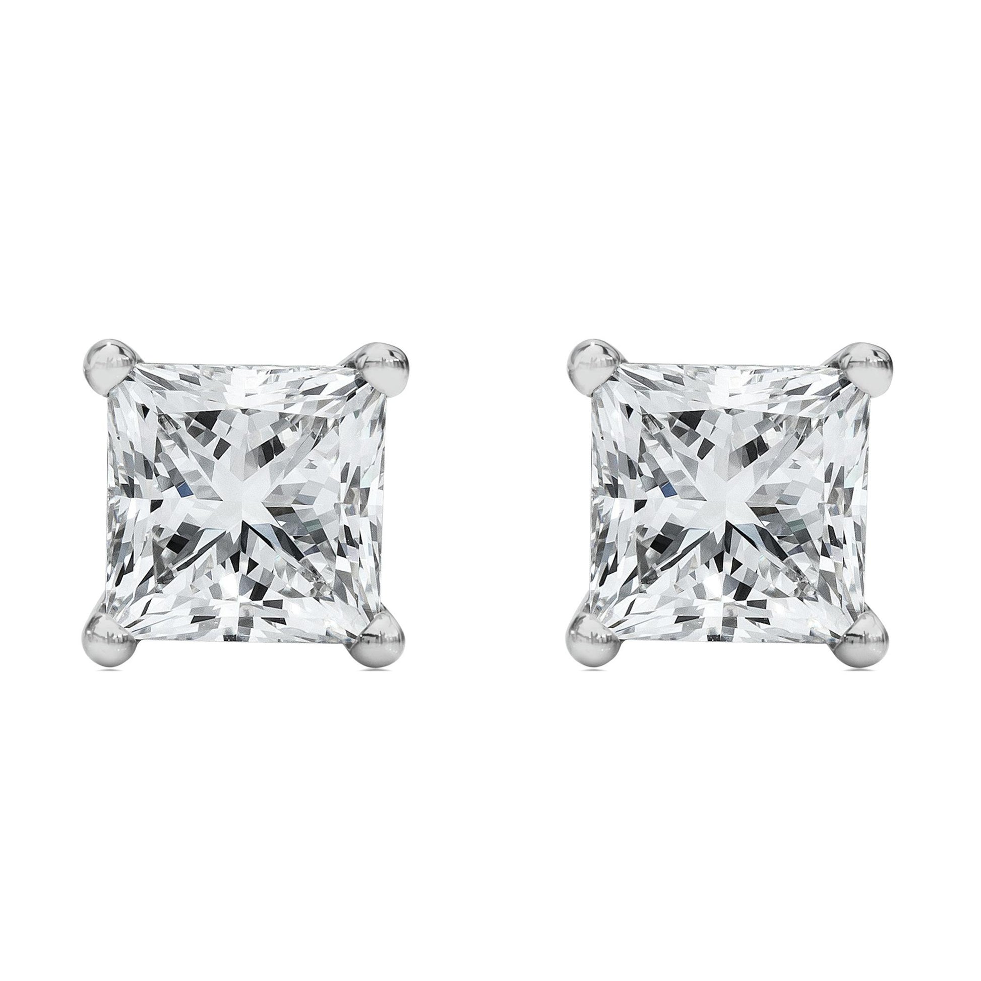 Pair of white metal stud earrings with princess-shaped white gemstones in a 4-prong setting, shown from the front angle.