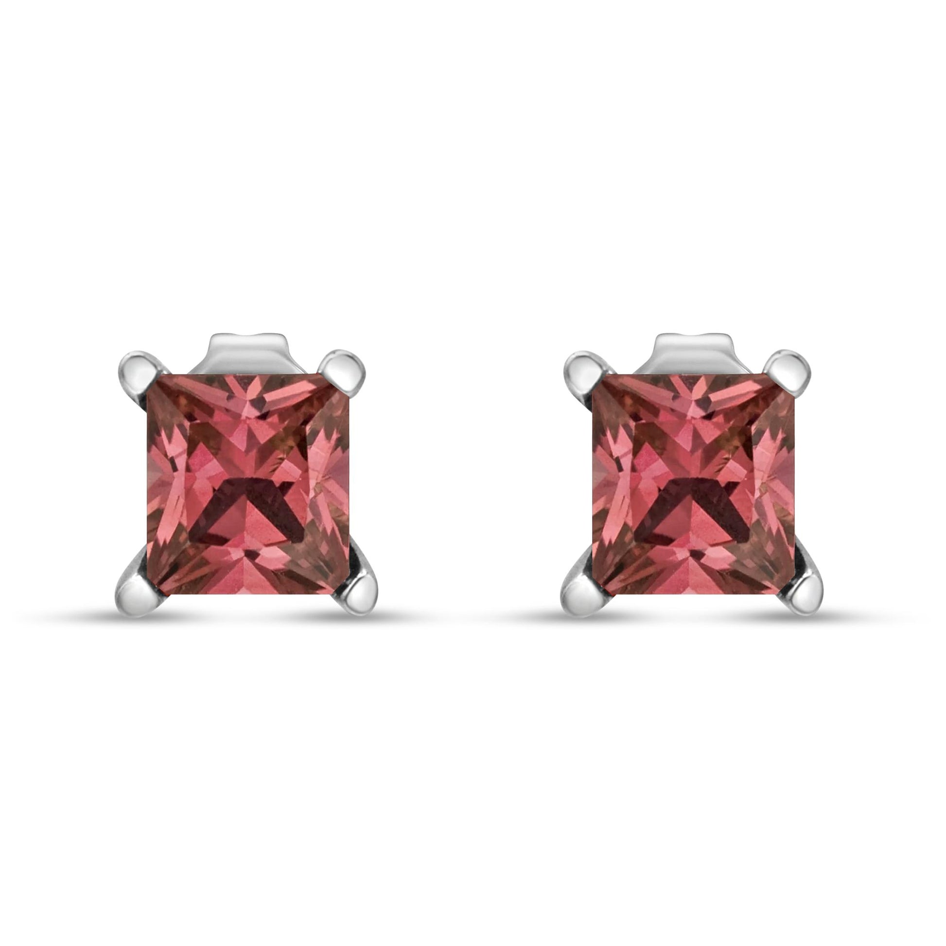 Front-facing close-up of white metal stud earrings with square pink gemstones in four-prong settings.