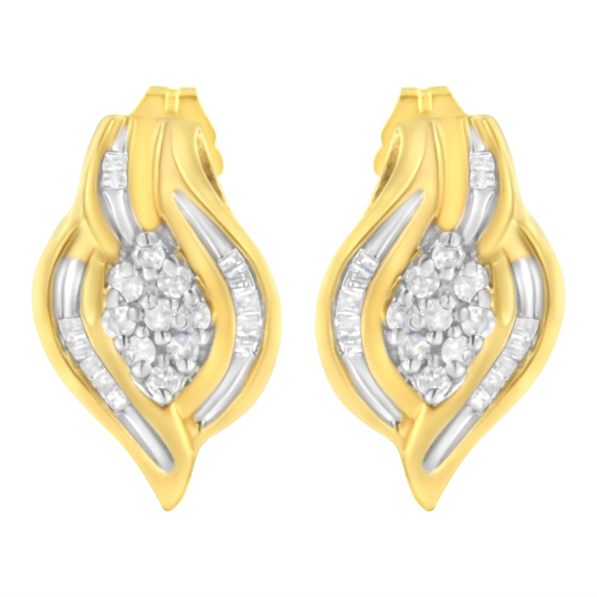 Pair of yellow metal earrings with a leaf-like shape, featuring white round gemstones in prong settings clustered in the center and white baguette gemstones in channel settings along the curves, shown from the front angle.
