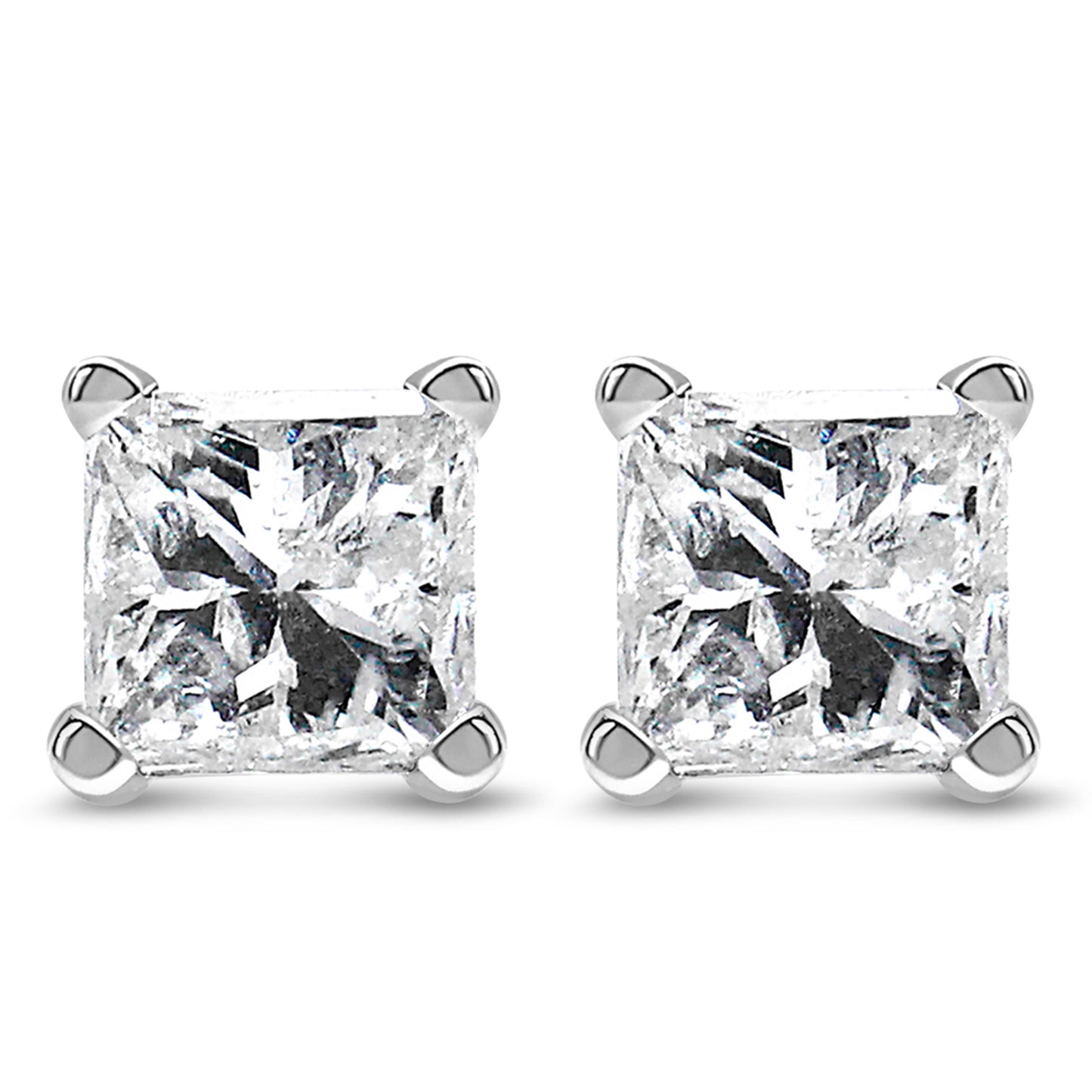 Pair of white metal stud earrings with princess shape white gemstones in four-prong settings, shown in a front-facing close-up shot.
