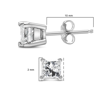 Close-up side and front views of a white metal stud earring featuring a single princess-shaped white gemstone in a four-prong setting, shown on a scale indicating dimensions.