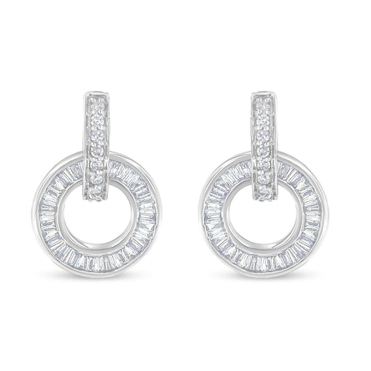 Front angle of white metal earrings with circular hoop design featuring channel-set baguette-shaped white gemstones around the hoop and prong-set round white gemstones on the hanging loop.