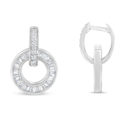 Front and side views of white metal earrings with circular design featuring round prong-set and baguette channel-set white gemstones, shot on a white background.