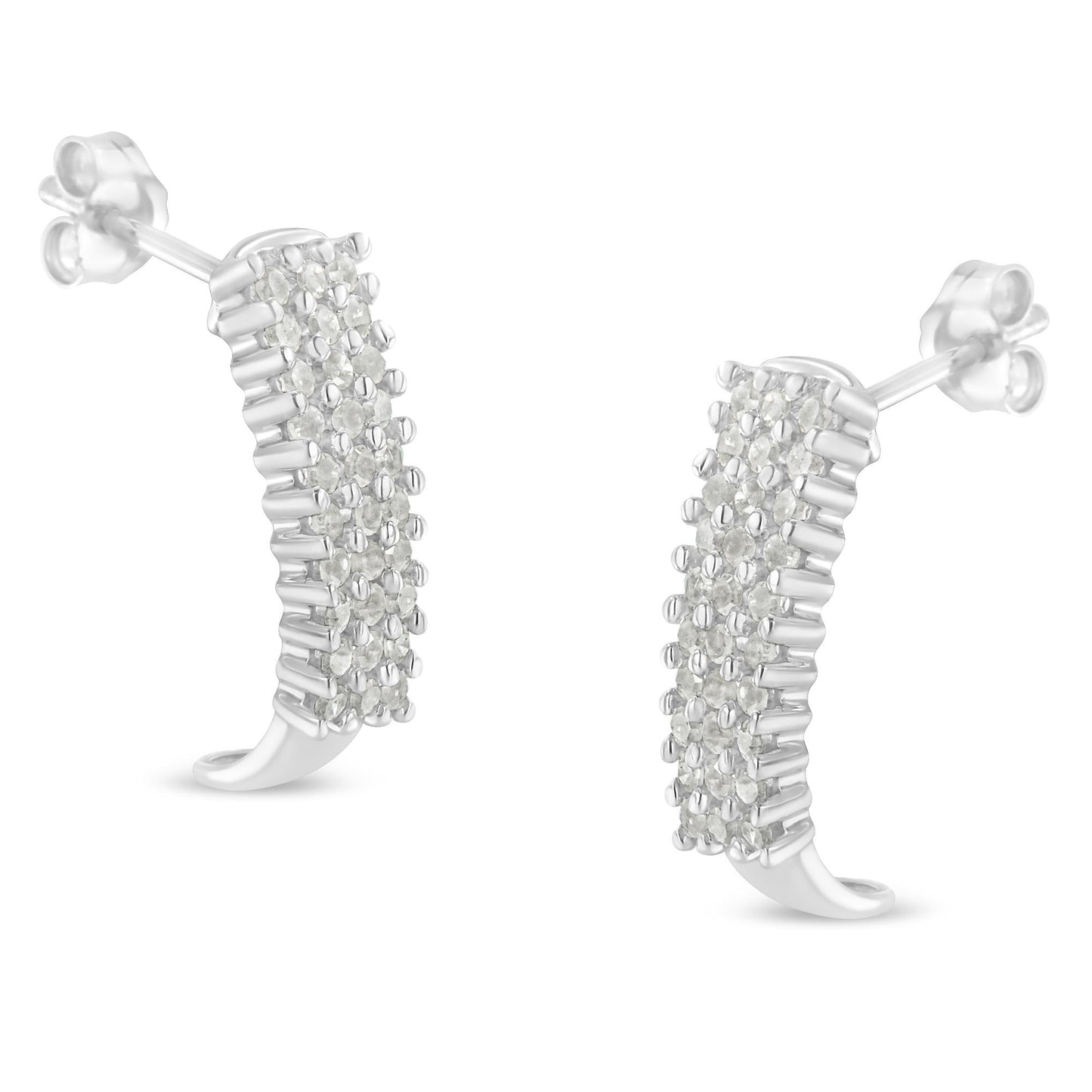 Pair of white curved stud earrings with multiple round white gemstones in prong settings, shown in a close-up front angle.