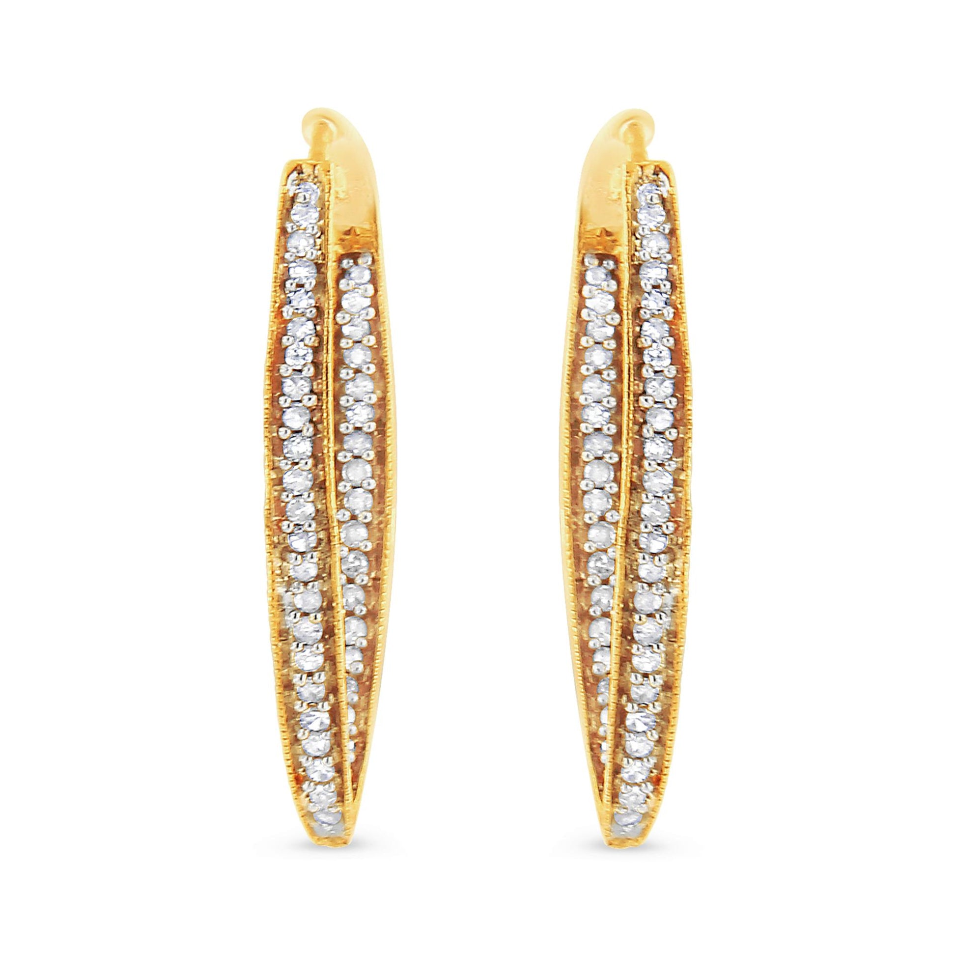 Pair of yellow metal earrings with two rows of prong-set white round gemstones, front-facing angle.