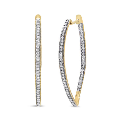 Pair of yellow metal hoop earrings with a line of prong-set white round gemstones, shown at a front and angled side view on a white background.