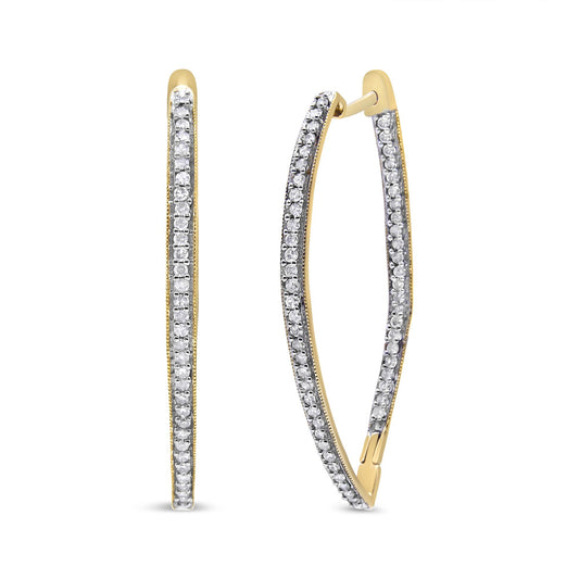 Pair of yellow metal hoop earrings with a line of prong-set white round gemstones, shown at a front and angled side view on a white background.