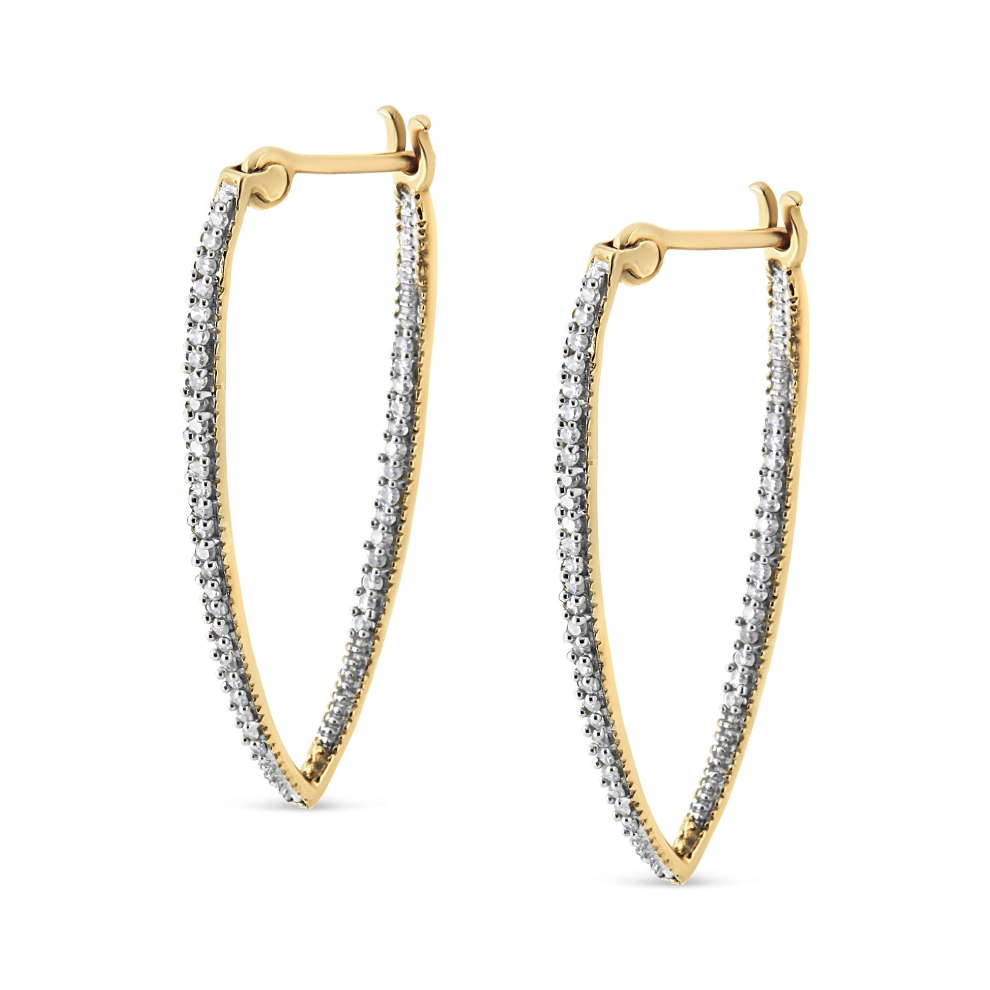 Pair of yellow metal hoop earrings with white round gemstones in prong setting, shown in a front angle view.