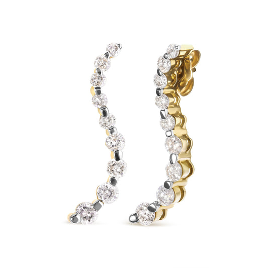 Pair of yellow metal hoop earrings with round white gemstones in prong settings, shown from a front and side angle.
