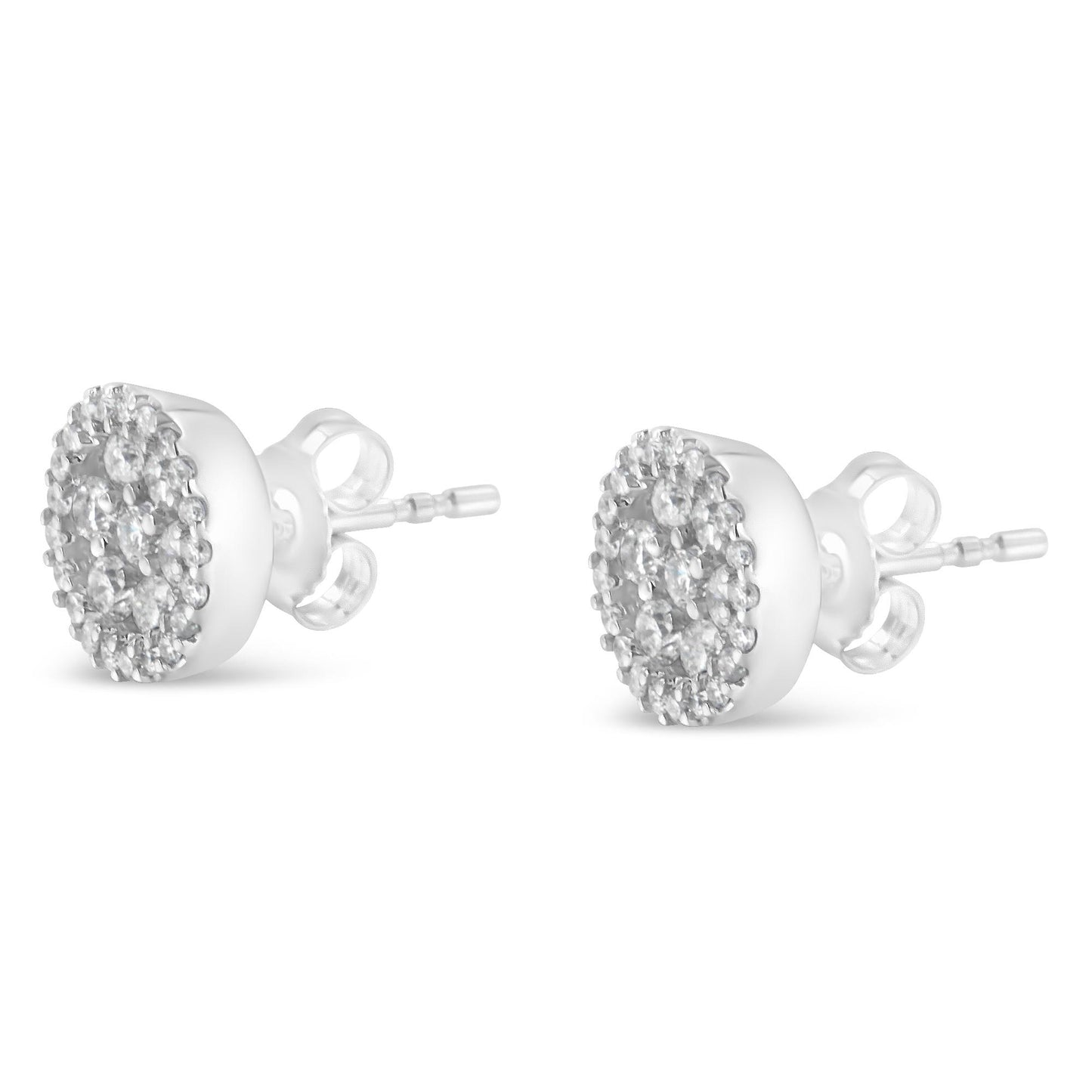 Pair of white metal round stud earrings with multiple white gemstones in tension and shared prong settings, shown in a front angled view.