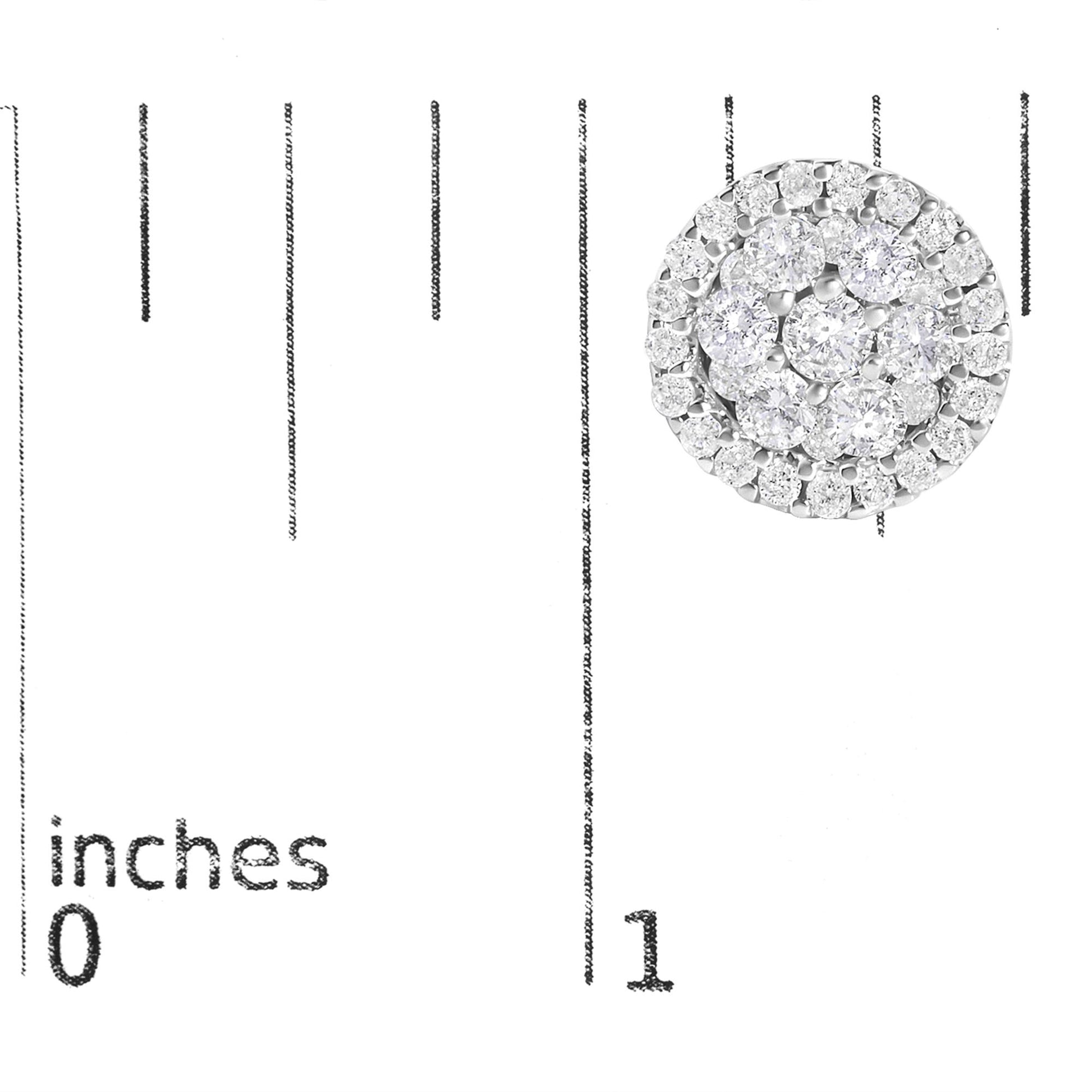 Close-up image of white metal round tension-set stud earrings placed on a ruler for size reference with a US nickel coin nearby.