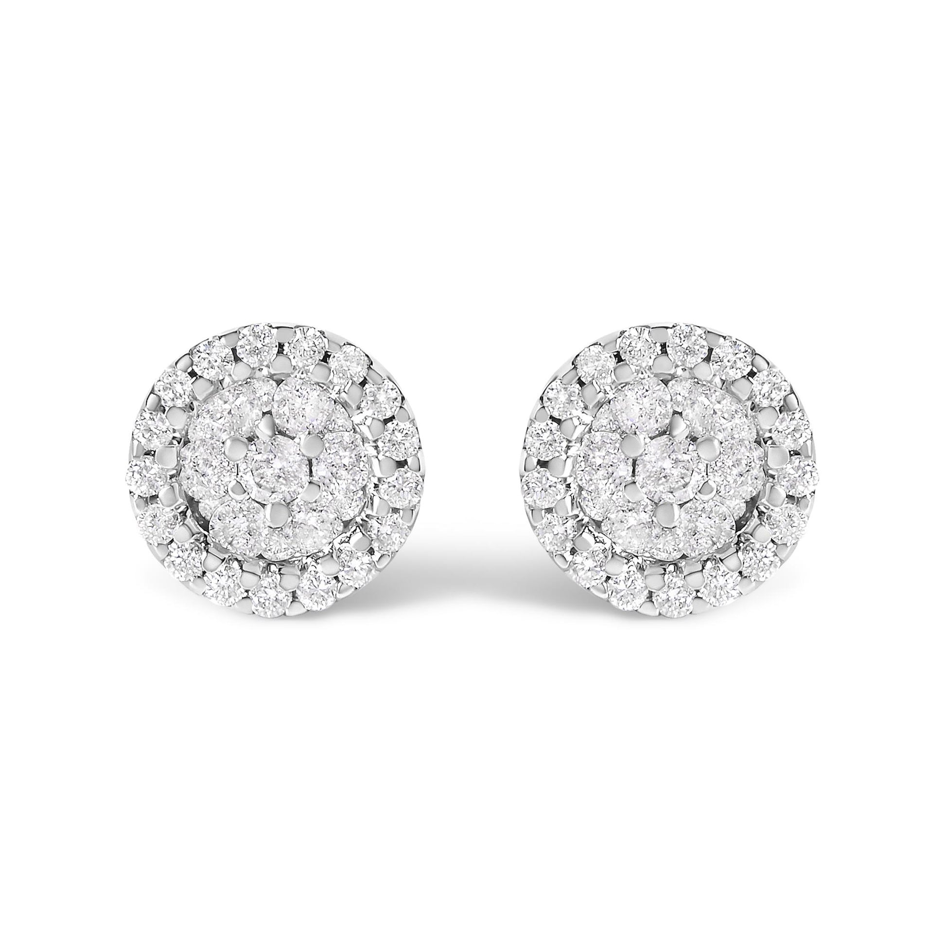 Pair of white metal round stud earrings with clustered white gemstones in prong setting, front angle view.